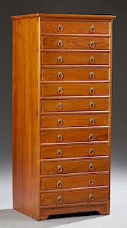 Danish Style Teak Tall Chest or Collector's Cabinet, 20th c., the square top over twelve felt lined deep drawers, each with d