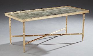 Louis XVI Style Gilt Bronze Marble Top Coffee Table, 20th c., the inset rectangular highly figured grey marble within a pierc