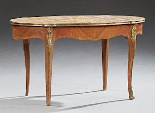 French Louis XV Style Ormolu Mounted Marble Top Carved Mahogany Coffee Table, 19th c., the oval serpentine inset highly figur