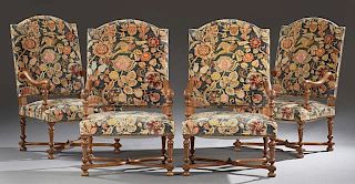 Set of Four French Carved Walnut Fauteuils a la Reine, 20th c., the canted arched high backs over serpentine scrolled arms, a