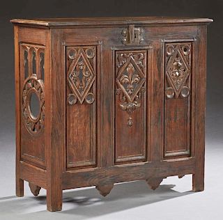 French Provincial Renaissance Style Carved Oak Steam Radiator Cover, 19th c., the lifting top over a front with pierced fleur