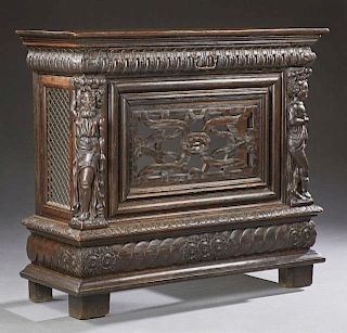 French Provincial Carved Walnut Steam Radiator Cover, early 20th c., the lifting top over a frieze drawer above a pierced car