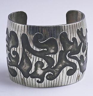 Native American Silver Wide Cuff Bracelet, 20th c., with inset darkened scrolled decoration, H.- 2 1/8 in., Int. W.- 2 5/16 i