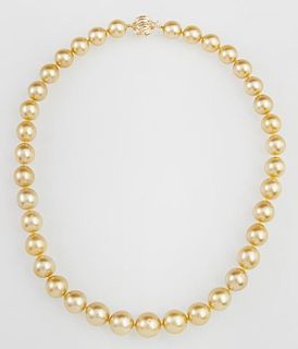 Graduated Strand of Thirty-Seven Rare Natural Golden Cultured South Seas Pearls, ranging from 10-13 mm, with a 14K white gold