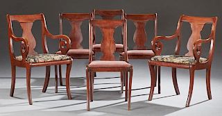 Set of Six American Empire Style Carved Birch Dining Chairs, early 20th c., consisting of two scroll armchairs and four side 