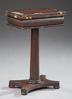 American Classical Faux Rosewood Mahogany Games Table, 19th c., the banded rectangular top swiveling opening to inlaid checke