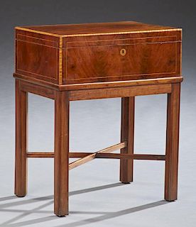English Inlaid Mahogany Document Box, 19th c., now mounted on a later reeded leg mahogany stand, joined by X-form stretchers,