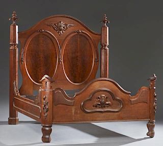 American Carved Walnut Highback Bed, c. 1880, possibly New Orleans, the arched top with an applied leaf and egg relief carvin