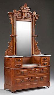 Renaissance Revival Carved Walnut Dropwell Dresser, c. 1880, with a relief carved leaf and scroll form crest over a mirror, f