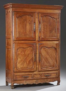 Unusual French Louis XV Style Carved Cherry Armoire, c. 1780, the rounded corner stepped ogee crown over fielded panel double