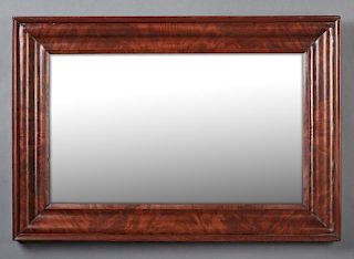 American Ogee Mahogany Mirror, 20th c., with a wide frame, H.- 26 1/8 in., W.- 37 7/8 in., D.- 2 1/4 in.