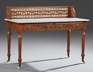 English Victorian Carved Walnut Marble Top Washstand, c. 1880, the rectangular backsplash inset with geometric and vine ceram