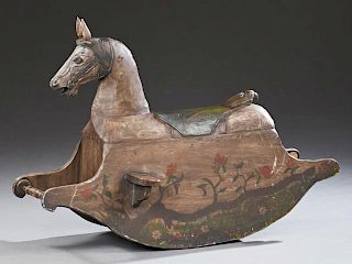 Child's Polychromed Carved Wood Rocking Horse, 20th c., with painted floral decoration, H.- 32 3/4 in., W.- 48 in., D.- 21 in