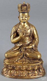 Sino Tibetan gilt bronze figure of a lama, 20th c., 7 1/2'' h.
