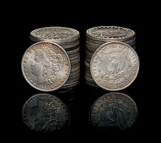 A Group of Thirty-Two United States Morgan Silver Dollar Coins