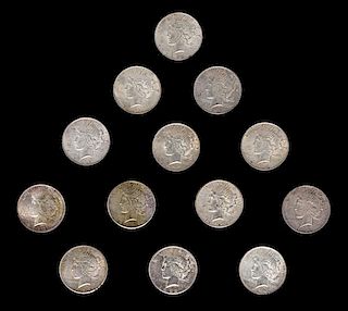 * A Group of Thirteen United States Peace Silver Dollar Coins