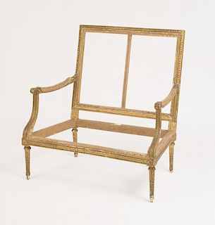 LOUIS XVI STYLE GILTWOOD MARQUISE FRAME, ADAPTED FROM A FAUTEUIL