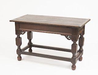BAROQUE STYLE STAINED OAK CENTER TABLE