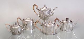 VICTORIAN SILVER TEAPOT, THREE SILVER PLATE TEAPOTS AND A COFFEE POT