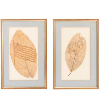 Pair intricately carved leaf silhouettes