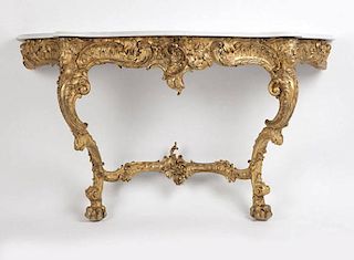 A Rococo style carved giltwood console table