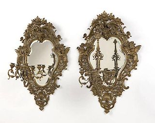 A pair of gilt bronze mirror-backed five-light wall sconces