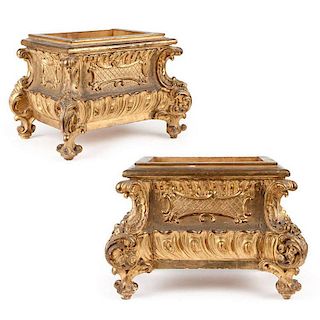 A pair of Italian Rococo carved and gilt wood jardinieres