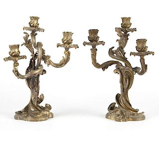 A pair of French gilt bronze three-branch candelabra