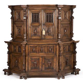 A Continental carved walnut court cupboard