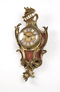 A French brass wall clock, E. Portelance