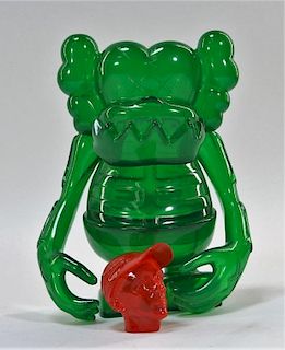 KAWS X Bounty Hunter Skull-Kun Green Toy Sculpture