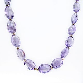 Approx. 162.0 Carat Oval Briolette Cut Graduated Amethyst Bead and 14 Karat Yellow Gold Necklace. B