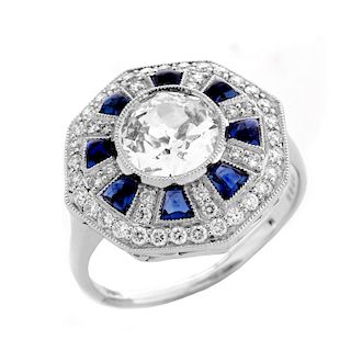 Art Deco style Approx. 1.44 Carat TW Diamond, .70 Carat Sapphire and Platinum Ring set in the Cente