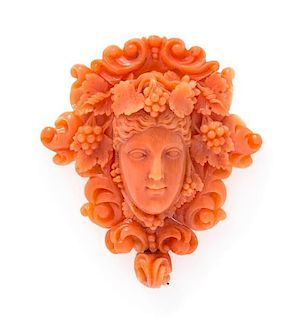 An Antique Carved Coral Bacchante Pendant/Brooch, 12.80 dwts.