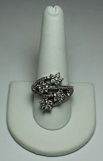 JEWELRY. 14kt White Gold and Floral Diamond Ring.