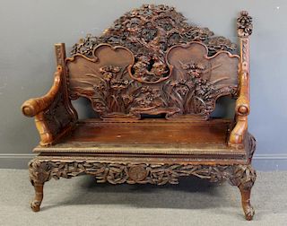 Highly Carved Wood Asian Settee.