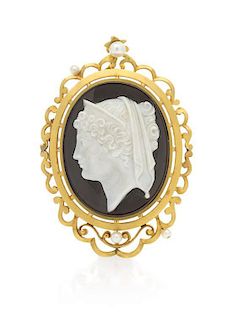 A Victorian Yellow Gold and Onyx Cameo Brooch/Pendant, 15.40 dwts.