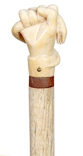 9. Serpent and Hand Nautical cane - mid 19th C. – A very well carved whale’s tooth handle, coconut wood spacer 3/4” whale bone shaft and no ferrule. H