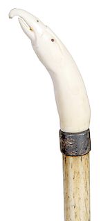 11. Eagle Whale Bone cane - mid 19th C. – A carved whale’s tooth eagle handle with shell eyes, silver collar, 5/8” whale bone shaft and a copper ferru