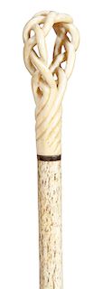 15. Fine Nautical cane – mid 19th C.  A delicate and unusual carving from a large whale’s tooth of a piece of rope which is meticulously carved, nice 