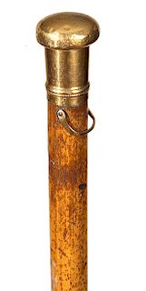 76. Gold Dress Cane- Ca. 1740- An early gold English dress cane, London hallmarks for 1739 and stamped “A.H.”, the thin malacca shaft also has a match