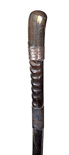 143. African Trophy Cane- dated, 1899- Large African horn which has two silver bands, average age cracks throughout the horn, and a missing ferrule, t