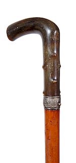 161. Black Horn Sword Cane- Ca. 1830- a faux twigspur horn handle, ornate collar, 26” blade with a working push button mechanism, malacca shaft and a 