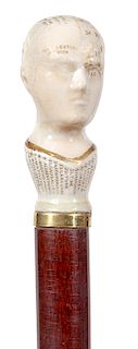 176. Phrenology Porcelain Cane- Mid 19th Century- A rare porcelain phrenology head in fine condition with some gold leaf decoration and also the inter