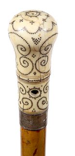 179. Ivory Pique Cane- Late 17th Century- A large prime example of one of the most sought after collector’s canes in fine condition, a pair of lanyard