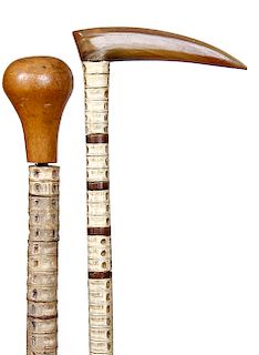 197. Pair of Shark Vertebrae Canes- Late 19th Century- One with a horn handle and the other an exotic wood, nice condition with no problem vertebrae a