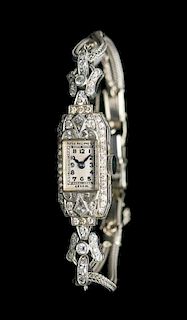 A Platinum and Diamond Wristwatch, Patek Philippe for Peacock, 11.50 dwts.