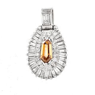 Vintage Approx. 1.35 Carat Fancy Yellow Brown Diamond and 18 Karat White Gold Pendant accented throughout with Baguette and Round Brilliant Cut Diamon