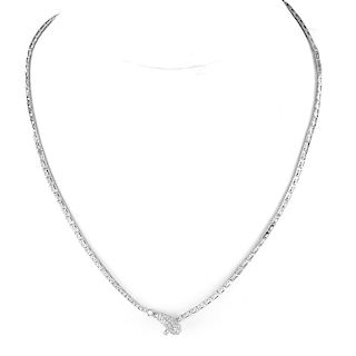 Vintage Micro Pave Set Diamond and 14 Karat White Gold Articulated Snake Lariat Necklace. Stamped 14K.