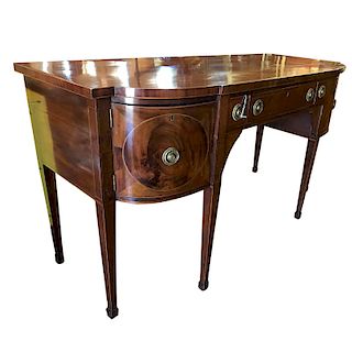 Antique Sheraton Flame Mahogany Sideboard. Center has fitted wide drawer, a pair of sliding doors, large deep drawers and large sliding drawer all wit